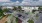 an aerial view of the apartment complex with cars in a parking lot