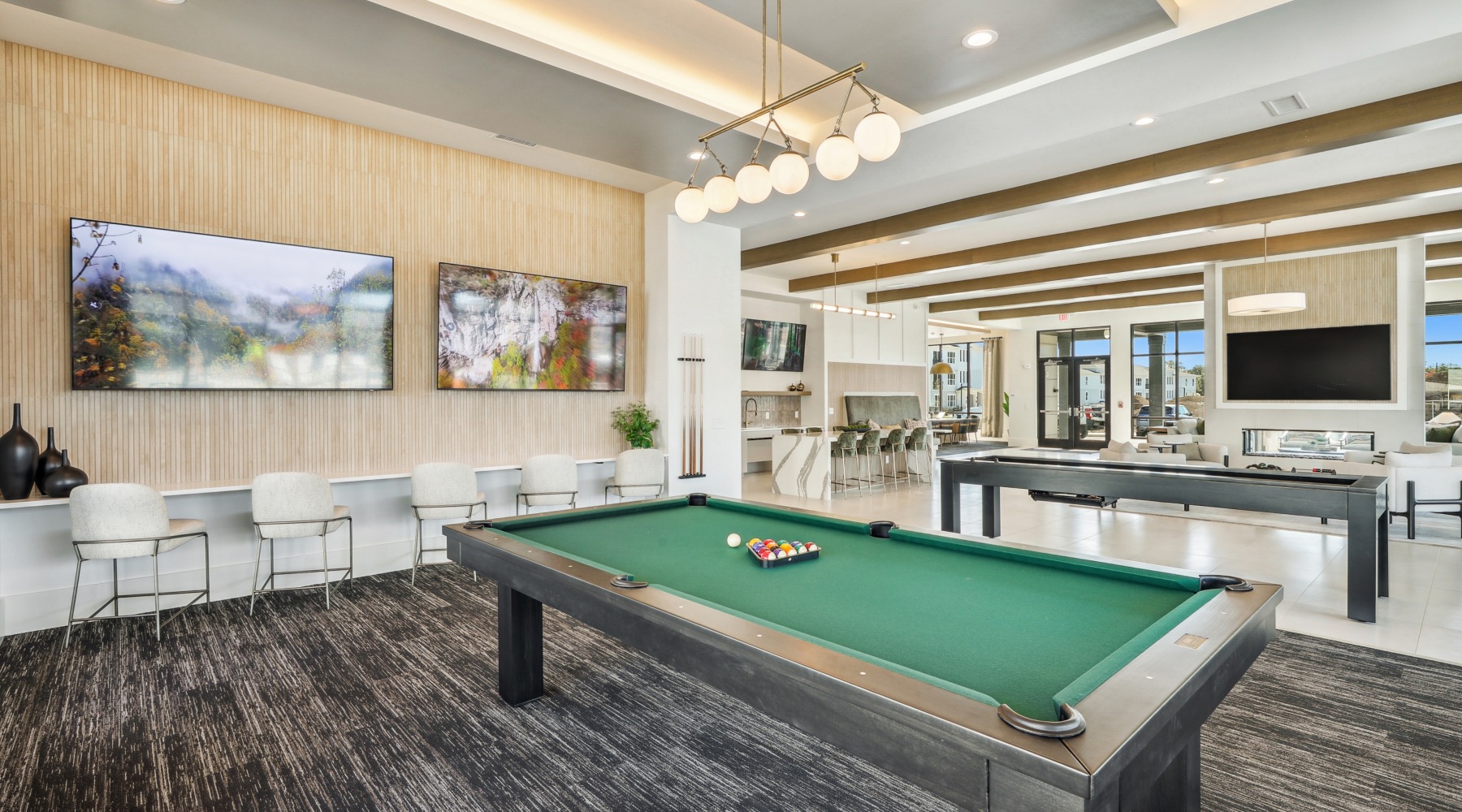 Game room with shuffle board, and pool table
